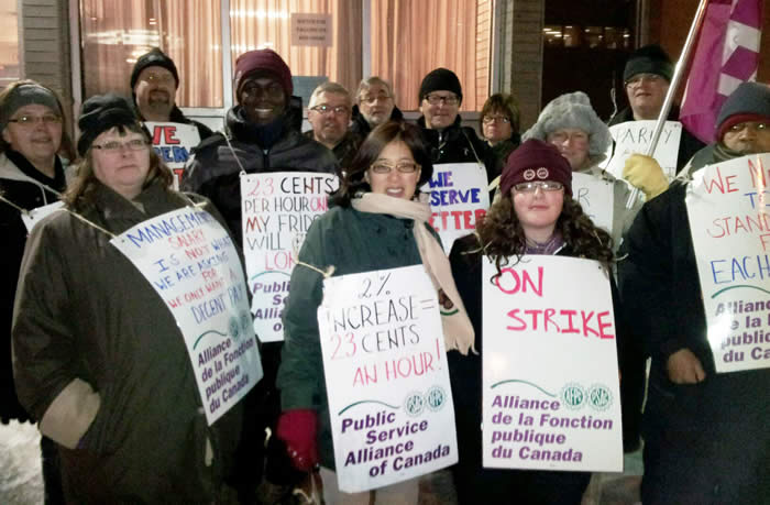 Photo of CFIA bargaining team supporting striking Salvation Army workers