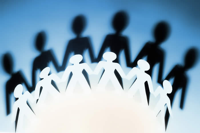 Paper cutout image of united workers