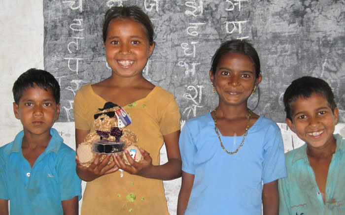 Photo of excited children in their new classroom